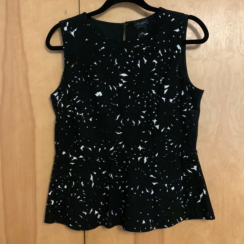 Ann Taylor sleeveless peplum blouse.